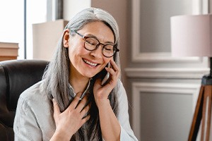 Senior woman engaged in phone conversation