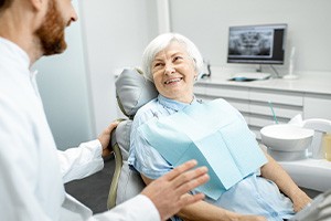 Senior patient interacting with her dentist